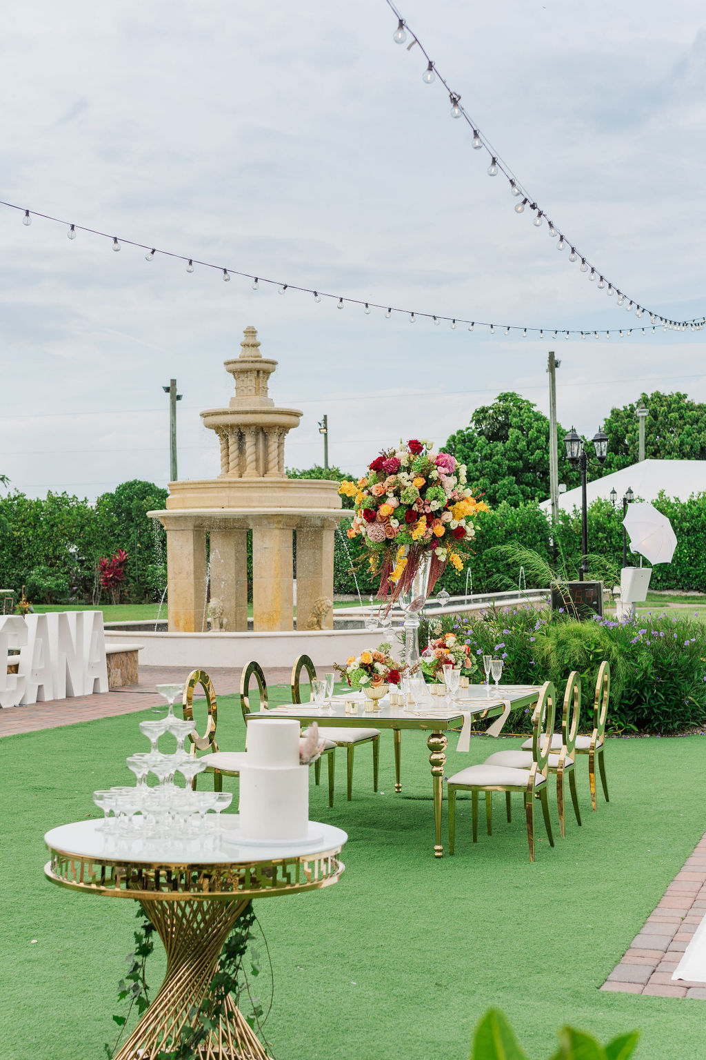 A wedding reception set up in the gardens of one of the european style wedding venues in florida